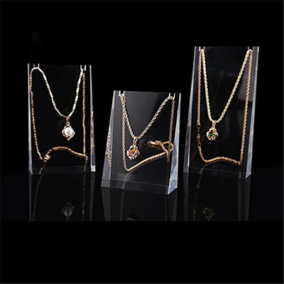 Die attraktiven einfachen Luxusacrylgegenspitzen-Schmuck-Bildsätze säubern